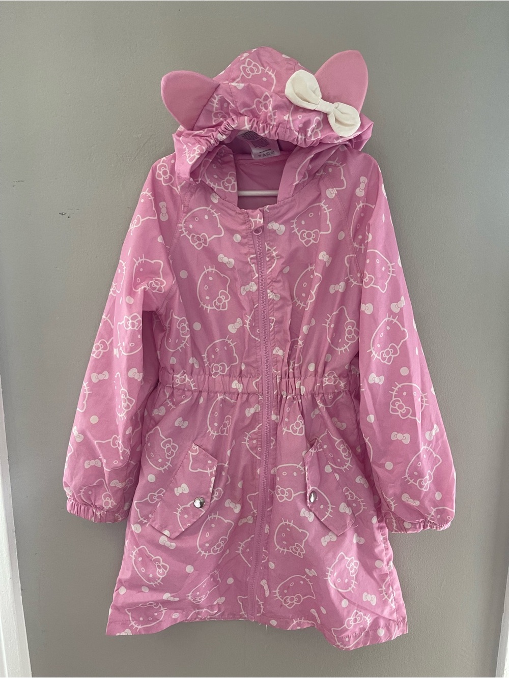 Hello Kitty Pink Hooded Raincoat with Ears and Bow Accent